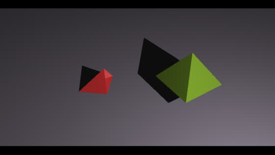 A red pyramid and a green pyramid