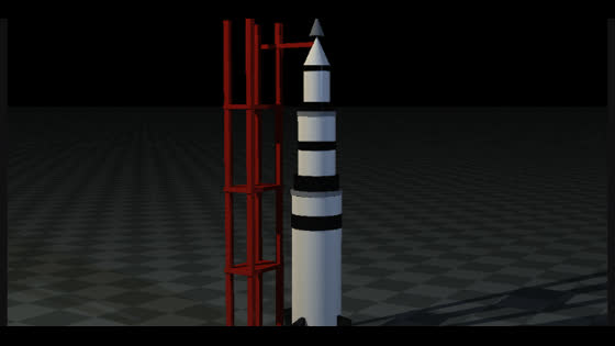 Saturn V rocket standing beside its launch tower